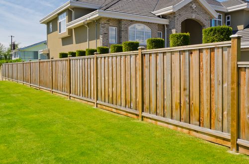 Fence replacement in Mauldin, SC with a new wood privacy fence rebuilt on a 1970s subdivision back line